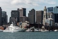 Yacht and sailing boats on Charles River in front of Boston Skyline in Massachusetts USA on a sunny summer day Royalty Free Stock Photo