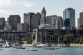 Yacht and sailing boats on Charles River in front of Boston Skyline in Massachusetts USA on a sunny summer day Royalty Free Stock Photo