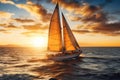 Yacht sailing in an open sea at sunset