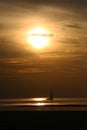 Yacht sailing at sunset Royalty Free Stock Photo