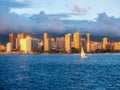 Yacht sailing at sunset in Waikiki Royalty Free Stock Photo