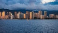 Yacht sailing at sunset in Waikiki Royalty Free Stock Photo