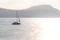 Yacht sailing towards the sun, Cape Panwa, Phuket, Thailand Royalty Free Stock Photo