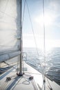 Yacht sailing towards the sunset Royalty Free Stock Photo