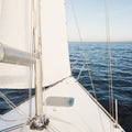 Yacht sailing towards the sunset Royalty Free Stock Photo