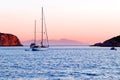 Yacht sailing in Vathi harbour Royalty Free Stock Photo