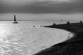 The yacht sailing on the waves of the sea bay, people sitting on Royalty Free Stock Photo