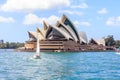 A yacht sails past the Opera House