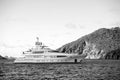 Yacht at sea coast on sunny blue sky in gustavia, st.barts. Yachting and sailing adventure. Luxury travel and voyage on Royalty Free Stock Photo