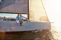 Yacht, sea and love with a mature couple sailing together on water for holiday, vacation or romance. Boat, ocean and Royalty Free Stock Photo