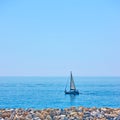 Yacht in the sea near coast Royalty Free Stock Photo