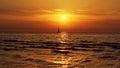 Yacht at sunset and orange sky