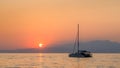 Yacht in the sea at sunset. Holidays in Greece. Royalty Free Stock Photo