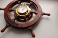Yacht Steering Wheel With Arrow Clock In Copper Edging Angle View Stock Photo