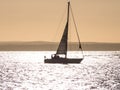 A yacht at sunset in the Solent Royalty Free Stock Photo