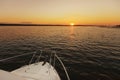 Yacht at sunset. Yacht in the sea. Nose of yachts at sunset. Yachting on the sea. Royalty Free Stock Photo