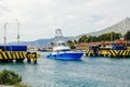 The yacht swims over the lowering bridge. Corinth Greece Royalty Free Stock Photo