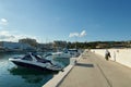 Yacht and tourist in port of cabopino, marbella Royalty Free Stock Photo