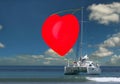 Yacht with Valentine Heart sail. Royalty Free Stock Photo