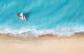 Yacht on the water surface from top view. Turquoise water background from top view.