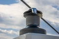 Yacht Winch Against a Cloudy Sky