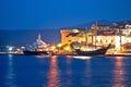 Yacht and wooden sailboat in Korcula harbor evening view Royalty Free Stock Photo