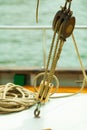 Yachting. Block with rope. Detail of a sailing boat Royalty Free Stock Photo