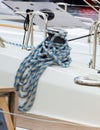 Yachting, coiled rope on sailboat, details of yacht Royalty Free Stock Photo