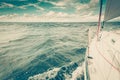 Yachting on sail boat bow stern shot splashing water Royalty Free Stock Photo