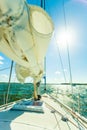 Yachting on sail boat during sunny weather Royalty Free Stock Photo