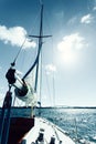 Yachting on sail boat during sunny weather Royalty Free Stock Photo