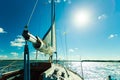 Yachting on sail boat during sunny weather Royalty Free Stock Photo