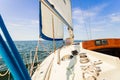 Yachting on sail boat during sunny weather Royalty Free Stock Photo