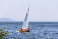 Yachting. A small yacht under sail on the reservoir Royalty Free Stock Photo