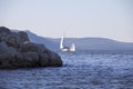 Yachting. A small yacht under sail on the reservoir Royalty Free Stock Photo