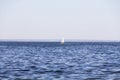 Yachting. A small yacht under sail on the reservoir Royalty Free Stock Photo