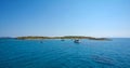 Yachts anchored at a Greek islet.