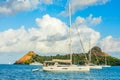 Yachts anchored at the Pigeon Island with fort ruin on the rock, Rodney bay, Saint Lucia, Caribbean sea Royalty Free Stock Photo