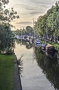 Yachts and barges at an Edam canal