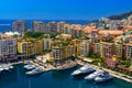 Yachts in bay near houses and hotels, Fontvielle, Monte-Carlo, Monaco, Cote d `Azur, French Riviera Royalty Free Stock Photo