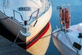 Yachts berthed in yacht harbor.