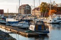 Yachts berthed in yacht harbor.