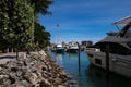 Yachts and bird. Life near the ocean. Beautiful port for yachts. Miami Beach. South beach style. Luxury speed yacht near Royalty Free Stock Photo