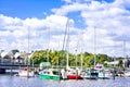 Yachts and boats anchored by a bridge across marina of Whangarei, New Zealand Royalty Free Stock Photo