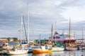 Yachts and boats and cruise liner  at pier in port of Svolvaer, Lototen islands, Austvagoya, Vagan Municipality, Nordland County, Royalty Free Stock Photo