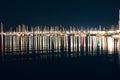 Yachts and boats in marina of La Spezia at night with reflection Royalty Free Stock Photo