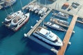 Yachts and boats moored in a marina. Aerial view. Aerial view of the yacht club. Aerial top down view of docked sailboats. Top Royalty Free Stock Photo