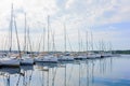 Yachts and boats parked in harbor, sunrise, morning