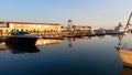 Yachts and boats at the pier, reflections in water Royalty Free Stock Photo