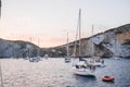 Yachts and boats in the sea at sunset. Luxury yachts and boats in the background. Royalty Free Stock Photo